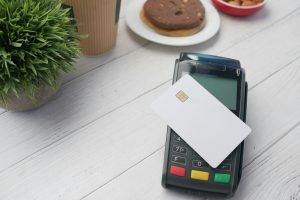 contactless payment concept credit card on a pos machine