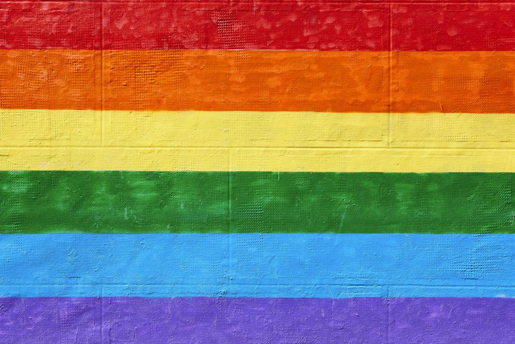 Lgtbi flag painted on a wall. Sexual equality and diversity