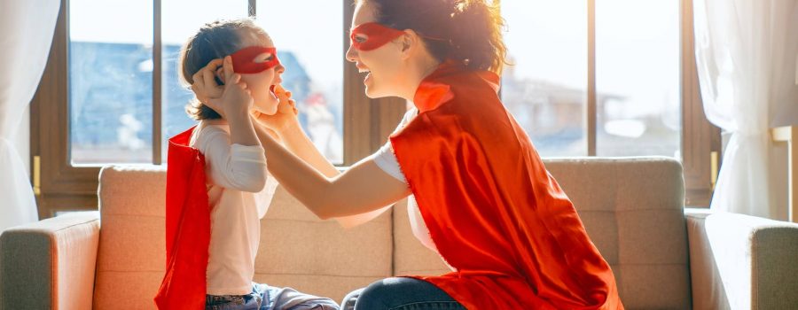 Family in Superhero costumes